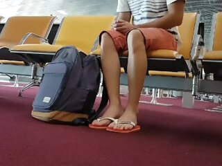 handjob Boy put on flip flops and anklet in airport amateur